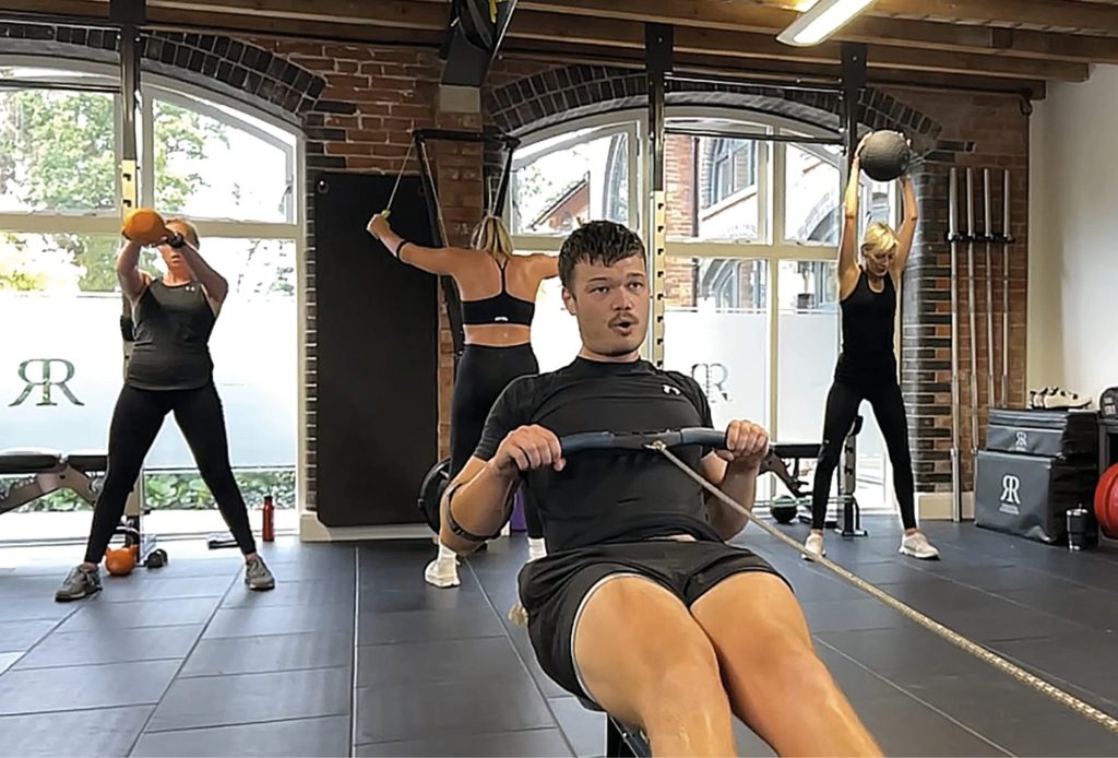A man on a rowing machine